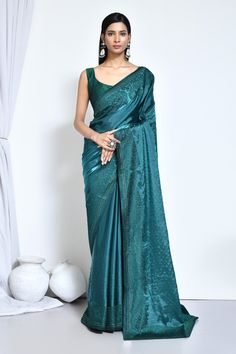 Teal Green satin silk stone work saree with blouse N8141A Get your hands on the newest collection of exquisite satin silk sarees adorned with intricate embroidery and stunning stone embellishments, all at budget-friendly prices. These sarees feature soft pastel tones and elegant floral designs, ensuring they remain stylish and timeless for years to come. Purchase these luxurious satin silk sarees exclusively at Kollybollyethnics. Desc:  Color : teal Green Fabric : satin silk  Work : stone&n Festive Satin Pre-draped Saree, Semi-stitched Satin Saree With Traditional Drape, Semi-stitched Satin Saree In Traditional Drape, Semi-stitched Satin Saree With Cutdana, Elegant Satin Saree With Resham Embroidery, Elegant Semi-stitched Satin Saree, Designer Wear Satin Saree With Traditional Drape, Designer Satin Saree Dupatta, Elegant Unstitched Satin Saree