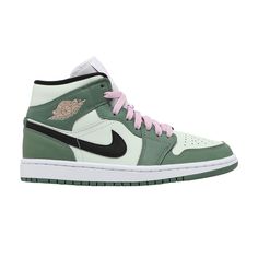 Find JORDAN Wmns 1 Mid Se 'dutch on Editorialist. The women’s Air Jordan 1 Mid SE ‘Dutch Green’ softens the classic silhouette with a spring-ready palette made up of contrasting pastel hues. Varying pale green shades are executed on the leather upper, accented with a black Swoosh and a pink Wings logo on the lateral collar flap. Matching pink hits land on the sneaker’s laces and woven tongue tag, featuring standard Jumpman branding. The mid-top is mounted on a rubber cupsole with encapsulated Nike Air cushioning in the heel. Jordan 1 Mid Dutch Green, Trendy Nike Shoes, Green Jordans, Wmns Air Jordan 1, Dr Shoes, Air Jordan 1 Mid Se, Womens Air Jordans, Green Sneakers, Womens Jordans