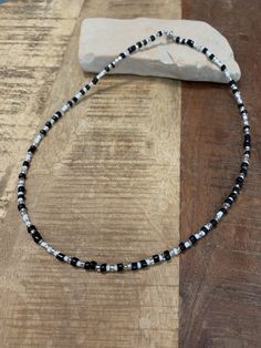 A simple necklace to wear with other necklaces or to wear alone. Black And White Beaded Necklace, White Beaded Necklace, Beaded Necklaces, Simple Necklace, Necklace Etsy, Porter, Beaded Necklace, Jewelry Necklaces, Necklaces