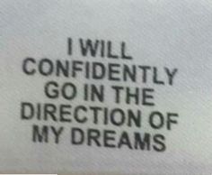 the words i will confidently go in the direction of my dreams written on a piece of paper