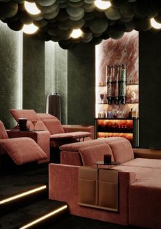 a living room filled with pink couches and chairs