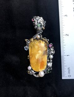 "ARTISAN AMBER GEMSTONE PENDANT Hand-made Sterling Silver 925. 24k Gold Stones used: Butterscotch Baltic Amber Pink&Green Tourmaline, Pearls Height - 2 3/4' (with bail), Width - 1 3/8' Height -70mm (with bail), Width - 35mm Unique Handcrafted One-of a-kind Design Pendant Each Piece of Jewelry in my Collection is Absolutely One of a Kind! When you start wearing a piece of my jewelry you will fall in love with it more and more each day and feel that good Energy and Love that I pass into it whi Luxury Citrine Gemstones For Gifts, Luxury Yellow Multi-stone Jewelry, Luxury Hallmarked Citrine Jewelry, Luxury Citrine Cabochon Jewelry, Luxury Handmade Rectangular Jewelry, Luxury Citrine Jewelry For Gifts, Artisan Silver Citrine Jewelry, Artisan Yellow Pendant Jewelry, Fine Jewelry Cabochon Gemstone Pendant