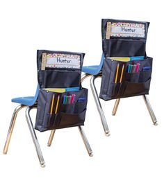 two school chairs with pencils, pens and markers in their pockets that are attached to the back of each chair