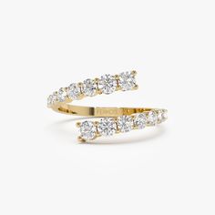 Enhance your jewelry collection with our 14K Round Diamond Cuff Ring, a unique and elegant piece featuring graduating diamonds. This gold open cuff band exudes sophistication, making it the perfect choice for a unique diamond statement ring or a memorable crossover diamond promise ring. Elevate your style with this captivating and versatile accessory that captures the essence of timeless beauty and commitment. ▶ Details   * Made to Order. * Gold KT: 14K Solid Gold (also available in 18K & Platin Luxury Platinum Open Band Jewelry, Luxury Open Band Bypass Ring For Anniversary, Luxury Bypass Ring With Brilliant Cut, Luxury Brilliant Cut Open Bypass Ring, Luxury Open Bypass Ring For Anniversary, Diamond Cuff Ring, Diamond Wrap Ring, Diamond Ring Gold, Diamond Promise Ring