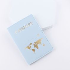 a passport sitting on top of a white table