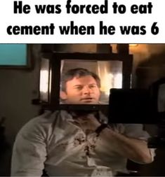 a man holding a camera up to his face with the caption he was forced to eat cement when he was 6