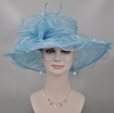 Light Blue Hat For Kentucky Derby Party, Light Blue Kentucky Derby Party Hat, Elegant Light Blue Mini Hat For Kentucky Derby, Elegant Light Blue Hat For Wedding, Elegant Light Blue Hat For Races, Elegant Light Blue Hats For Spring, Elegant Light Blue Hat For Spring, Elegant Adjustable Light Blue Hats, Elegant Light Blue Spring Hat