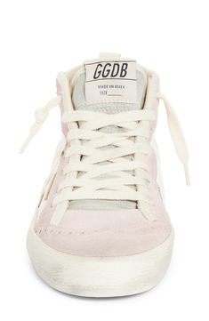 The label brings its signature scuffed and dirty look to this handcrafted sneaker that features gleaming studs, color-pop trim and broguing at the toe. Lace-up style Leather and textile upper/textile and leather lining/rubber sole Made in Italy Designer Shoes Preppy Golden Goose Purse, Shoes Like Golden Goose, Golden Goose Sneakers Pink, Golden Goose High Tops, Golden Goose Mid Star Pink, Golden Goose Collection, Pink Golden Goose, Womens Pink Sneakers, Best Volleyball Shoes