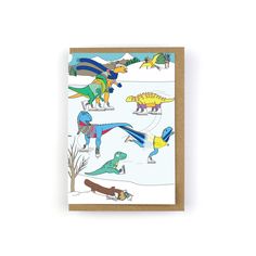 a greeting card featuring dinosaurs in the snow