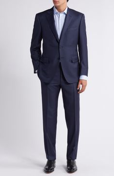 Classic and smart, this wool suit styled in a dark solid features traditional detailing that makes it a versatile addition to any formal wardrobe. 31 1/2" length (size 52EU) Jacket has notched lapels; chest pocket; flap pockets; side vents Cuff buttons may not be attached. Jackets purchased at full price can have the sleeve length customized for free at your local Nordstrom Trousers have zip fly; slant pockets; back button-welt pockets Unhemmed Jacket is lined; pants partially lined 100% wool Dr Wool Suit And Tie Accessories For Business Casual, Wool Three-piece Suit For Business Casual, Classic Wool Blazer For Business Trips, Tailored Wool Suits For Semi-formal Occasions, Business Casual Wool Three-piece Suit With Welt Pockets, Wool Suit With Pressed Crease For Business Casual, Timeless Suits For Business Casual, Timeless Business Casual Suit In Suiting Fabric, Semi-formal Suits With Lapel Collar And Welt Pockets