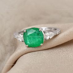 "Dive into the magical temptation of this stunning Ring in attractive shape and design made of White Gold studded with Zambian Emerald. An essential ornament to add in your jewellery collection! ✧✧Welcome To Our Shop Spectrum Jewels India✧✧ \"\"18k White Gold Wedding Ring Jewelry, Zambian Emerald Diamond Ring, Natural Brilliant Cut Zambian Emerald Statement Ring For Anniversary Gift\"\" ★PRODUCT SPECIFICATION★ * ITEM CODE - SER-21324A * METAL - 18k White Gold * 18k White Gold Weight : 2.58 gm  * Dainty Diamond Engagement Ring, Emerald Statement Ring, Cushion Making, White Gold Promise Ring, Rings Dainty, Emerald Diamond Earrings, White Gold Wedding Ring, Wedding Diamond, Emerald Wedding Rings