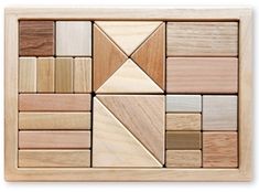 the wooden puzzle is made up of different types of wood