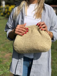 HANDMADE STRAW POUCH CLUTCH BAG 🛍️Inspired by nature sustainable fashion ✅Any woman must have this bag for every fashionista.Whether you keeping it to yourself or gifting someone you care, it will be unforgettable. Daily use, a fashionable women's accessory for special occasions ✅I made this beautiful clutch from natural paper rope which is organic cotton. ✅The interior of the straw summer bag is fully lined with cotton and has a hidden metal lock. A lining of the appropriate color is sewn into Cream Pouch Straw Bag For Daily Use, Chic Handmade Beige Clutch, Handmade Cream Jute Bag, Eco-friendly Beige Straw Bag For Gift, Handmade Natural Clutch Shoulder Bag, Handmade Natural Color Clutch Shoulder Bag, Beige Crochet Clutch Shoulder Bag, Handmade Natural Color Clutch Bag, Handmade Natural Color Clutch For Everyday