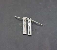 "Tiny flowers are individually cut into these sterling silver earrings.  Simple and lightweight.  1.5\" long" Tiny Flowers, Metal Jewelry, Metal Working, Sterling Silver Earrings, Silver Earrings, Etsy Earrings, Jewelry Earrings, Etsy Gift Card, United States