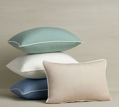 four pillows stacked on top of each other