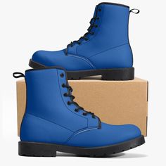 Our elegant Leather Combat Boots are crafted for timeless style and durability. Featuring a sleek design with a comfortable, padded insole and sturdy outsole, these boots offer both sophistication and support. Blue Leather Boots For Streetwear, Blue Waterproof Boots With Round Toe, Waterproof Blue Boots With Round Toe, Blue High-top Winter Boots, Blue Waterproof Round Toe Boots, Casual Blue High-top Waterproof Boots, Casual High Ankle Blue Boots, Casual Blue High Ankle Boots, Casual Faux Leather Boots For Streetwear