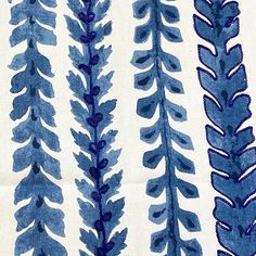 blue and white fabric with different designs on the side, including two rows of leaves