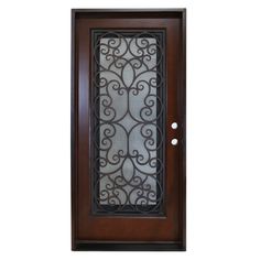 a wooden door with wrought iron design on the front and side panels, in dark wood