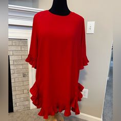 Adorable Ruffled Red Dress. Nwt. Poly/Cotton Blend Drapes Beautifully. 34 Inches Long. 24 Inches Pit To Pit. Small Imperfection (See Photo) Barely Noticeable. Style We Sizing Is Crazy. No Way This Is A 3x. More Like Xl/Size 14 Based On How It Fits. Red Ruffle Hem Dress For Holidays, Red Holiday Dress With Ruffle Hem, Red Dress With Ruffle Hem And Sleeves, Red Dresses With Ruffle Hem And Ruffle Sleeve, Red Dress With Ruffle Hem And Ruffle Sleeves, Red Ruffle Hem Dress With Ruffle Sleeves, Red Long Sleeve Peasant Dress, Red Knee-length Dress With Ruffle Hem, Bohemian Red Dresses With 3/4 Sleeve