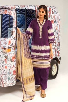 100% Original Brand New Latest Sana Safinaz Mahay  Collection 17B Three-piece suit. Stitched to Small size. Summer calls for quirky tie & dyes and bold colours! A purple lawn base is rendered with tie and dye prints, featuring a geometric style embroidered patti on a cream organza base. The complete look comes together with the mauve silver chiffon dupatta, layered with painterly crafted motifs evocative of block printing and designs in cream and beige. Fabric details: Printed Lawn Shirt with Embroidered Patti on neckline Printed Dupatta On Silver Chiffon with lace attached on all four sides Dyed Pants with lace on hem. Measurements: Chest - 39.5 Inches Waist - 37.5 Inches Shoulder - 14.5 Inches Sleeve Length - 20 Inches Shirt Length - 38.5 Inches Trouser Length - 40 Inches 1. Please note Unstitched Long Sleeve Block Print Salwar Kameez, Purple Cotton Dupatta For Eid, Purple Cotton Kurta With Dupatta, Eid Cambric Lawn Suit With Block Print, Purple Cotton Lawn Suit With Printed Motifs, Purple Cotton Churidar For Eid, Unstitched Purple Salwar Kameez With Printed Motifs, Purple Cotton Salwar Kameez With Resham Embroidery, Traditional Purple Salwar Kameez With Printed Motifs