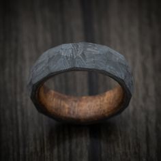 This Carbon Fiber ring features:- 7mm width shown- Faceted Shape- Chestnut Wood Sleeve Carbon Fiber Ring, Chestnut Wood, Carbon Fiber Rings, Men's Ring, Chestnut, Carbon Fiber, Rings For Men, Ring, Wood