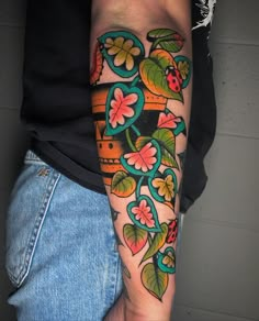 a person with a colorful tattoo on their arm