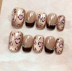 Elevate your nail game with this fabulous Heart Print Leopard Nail Art Set! Featuring a trendy leopard print with playful hearts, this set combines wild beauty with a touch of romance. The warm, earthy tones provide a chic backdrop for the eye-catching designs, making these nails perfect for any occasion. Whether you're hitting the town or just want to feel fabulous at home, these nails will make a statement. Gift yourself or surprise a friend with this unique set--it's an ideal choice for any n Leopard Nail Art, Cheetah Nails, Nail Art Set, Leopard Nails, Wild Beauty, Nails For Women, Handmade Gifts For Her, Fake Nail, Jan 1