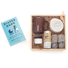 New dads need pampering too! Our signature gender-neutral 'Doting Dad' gift box is packed with essentials to keep Dad energized and ready for anything, with a few fun things for baby too! Includes a baby balm, swaddling blanket, and stylish moccasins for baby. To keep Dad on his toes, a cold brew coffee, Teakwood mug, and the 'Diaper Dude' book! The perfect gift for dads-to-be in the workplace, pregnancy announcements, an off-registry baby shower option, or to welcome baby home! FREE U.S. SHIPPING + COMPLIMENTARY HANDWRITTEN NOTECARD ~section 2~ GIFT CONTENTS: Large Pine Gift Box; Baby Balm; Bamboo Swaddling Blanket; Baby Moccasins; Vanilla Latte Coffee Beverage; Teakwood Mug; 'Diaper Dude' Book; Kraft Basket Fill; Letterpressed Calligraphy Gift Tag; Double-Sided Satin Ribbon in Sable; Dri Dad To Be Fathers Day Gift, Baby Shower Gifts For Dad First Time, New Dad Gift Basket, Things For Baby, Gifts For Expecting Dads, Father’s Day Gift For Expecting Dads, Calligraphy Gift Tags, Baby 2024, Baby Balm