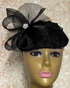 Black lace flower hat base. Trimmed with bows and rhinestones. Who said black hats had to be boring? Perfect for church functions and special occasions, such as weddings. The hat is affixed to the head via a hat string. The hat measures 10x7 inches. Handmade Gifts for mom, sister, wife, or yourself. SHIPPING  All items for free shipping will be shipped via USPS FIRST CLASS MAIL. Elegant Black Cloche Fascinator, Black Gatsby Style Fascinator For Evening, Black Gatsby Fascinator For Evening, Elegant Black Mini Hat For Church, Black Cloche Costume Hat For Wedding, Black Cloche Wedding Hats And Headpieces, Black Cloche Wedding Hat, Black Curved Brim Costume Hat For Weddings, Black Mini Hat With Curved Brim For Wedding