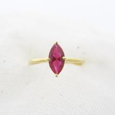 Exquisite Marquise Lab-Grown Ruby Ring: Timeless Elegance. Discover the allure of our lab-grown Marquise Ruby Ring, a symbol of everlasting elegance and sophistication. Crafted to perfection for a touch of luxury. Gemstone  ✦ 𝗟𝗮𝗯 𝗚𝗿𝗼𝘄𝗻 / 𝗖𝗿𝗲𝗮𝘁𝗲𝗱 𝗥𝘂𝗯𝘆 - 𝗠𝗮𝗻 𝗠𝗮𝗱𝗲 ✦ Marquise Cut -  AAA clarity - eye clean ✦ Brilliant Round Cut - F/ G / H  ✦ VS / SI ( 1 - 2 ) - eye clean ✦ Excellent / Very Good Cut ✦ Size (mm) : 6/3 ,  8/4,  10/5 mm  (Size options - approx) ✦ Setting :  𝗣? Marquise Cut Wedding Rings, Rubin Ring, Red Gemstone Ring, July Birthstone Ring, July Birthday, Birthday Ring, Promise Rings For Her, Red Gemstones, July Birthstone