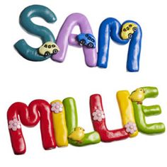 the words say smile while painted in different colors and shapes with cars on top of them