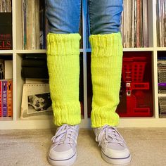 "Keep your legs warm this winter with these neon yellow pair of leg warmers. They are super bright and soft.  Leg warmers measure about 17-18\" in length and almost 6\" wide. The model has a calf circumference of about 14.5\".  These stretch and should fit most adult ladies legs. 100% acrylic yarn. Machine washable. Low iron. Do not bleach. Dry flat. All are handmade in the USA. If you have any questions about the sizing and fit, please message me. If the item received is damaged, please contact Trendy Yellow Winter Socks, Trendy Yellow Socks, Green One Size Leg Warmers For Winter, One Size Green Leg Warmers For Winter, Fitted Green Knee-high Socks For Winter, Green Stretch Leg Warmers Casual Style, Knitted Leg Warmers, Knit Leg Warmers, Leg Warmer