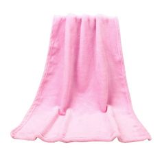 a pink towel is folded up on a white background