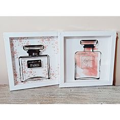 two framed pictures with perfume bottles in them