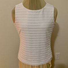 Calvin Klein White Sleeveless Top 90% Polyester; 10% Spandex With 100% Polyester Lining Size Medium Petite Never Worn All My Items Are New Or Like New In Excellent Condition. Spring Sleeveless Fitted Blouse, Fitted White Tank Top For Spring, Calvin Klein Stretch Tops For Spring, Spring Stretch Calvin Klein Tops, Calvin Klein Spring Tops, Spring Sleeveless Fitted Tank Top, Fitted Sleeveless Blouse Tank Top For Spring, Spring Sleeveless Fitted Top, Fitted Sleeveless Top For Spring