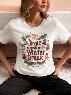 Get ready to jingle all the way to winter break with this fun and festive Christmas teacher shirt! Perfect for showing off your holiday spirit in the classroom, this cozy top will have both students and colleagues smiling. Whether you're counting down the days or just love spreading Christmas cheer, this shirt is the perfect way to celebrate the season. Makes a great gift for teachers, educators, or anyone who's ready for a well-deserved break! This classic unisex jersey short sleeve tee fits like a well-loved favorite. Soft cotton and quality print make users fall in love with it over and over again. These t-shirts have-ribbed knit collars to bolster shaping. The shoulders are tapered for a better fit over time. Dual side seams hold the garment's shape for longer. .: Made with 100% Airlum White Letter Print Top For Holiday, White Letter Print Tops For Holiday, White Graphic Tee For Winter, White Christmas Letter Print Tops, White Winter Holiday T-shirt, White Graphic Tee For Holiday, Holiday White Graphic Tee Top, Holiday White Graphic Tee, White Holiday Graphic Tee