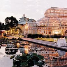 an image of a building that is reflecting in the water