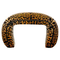 an animal print headband is shown against a white background