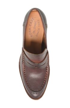 A classic penny keeper and loafer-inspired topline add timeless sophistication to a burnished leather pump balanced by a slender moc toe and stacked block heel. 3" heel Leather upper/textile lining/rubber sole Imported Classic Cap Toe Loafers With Branded Insole, Classic Round Toe Moccasins In Bridle Leather, Classic Bridle Leather Moccasins With Round Toe, Classic Brown Tassel Loafers, Classic Wingtip Moccasins, Classic Moc Toe Bridle Leather Dress Shoes, Classic Bridle Leather Moc Toe Dress Shoes, Classic Bridle Leather Loafers With Rubber Sole, Classic Bridle Leather Loafers With Leather Lining