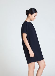 KAAREM - Angle Mini Dolman Open Back Dress - Black Blue Chic Short Sleeve Dress With Button Back, Chic Short Sleeve Button Back Dress, Short Sleeve Dress With Button Back For Daywear, Button-back Dresses For Daywear, Button Back Mini Dress For Workwear, Chic Mini Dress With Button Back, Elegant Short Sleeve Button Back Dress, Open Back Dress, The Triangle