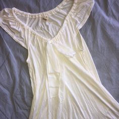 100% Rayon Never Worn. Flowy Sleeves And Body Of Top Altogether. Cream Sleeveless Daytime Top, Cream Sleeveless Top For Daytime, Spring Cream Viscose Top, Casual Cream Tops For Daytime, Cream Feminine Tops For Daytime, Flowy Cream Casual Tops, White Viscose Top For Day Out, Casual Cream Flowy Tops, White Viscose Beach Tops