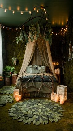 a canopy bed in a bedroom decorated with greenery and lit candles on the floor