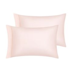 two light pink pillows on a white background