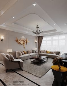 a living room filled with lots of furniture and a chandelier hanging from the ceiling