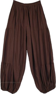 These perfect pair of loose rayon harem pants - without the usual tie-dye - might just be what you need for the season, with their comfy fabric and snug waist they are sure to make you feel great - whatever your mood.  The pants have an elastic waist and elastic on the ankles for ease of comfort. #tlb #SplitSkirtsPants #Yoga #hippieharempants #gypsyhippiepants #hippiewidelegpants Harem Pant Outfits, The Little Bazaar Pants, Brown Ankle-length Harem Pants With Elastic Waistband, Baggy Brown Harem Pants With Elastic Waistband, Bohemian Brown Harem Pants For Spring, Brown Bohemian Ankle-length Harem Pants, Bohemian Brown Ankle-length Harem Pants, Solid Cotton Bohemian Harem Pants, Solid Bohemian Cotton Harem Pants