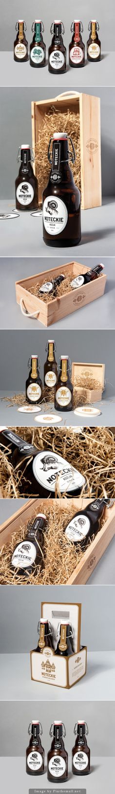 an assortment of different types of bottles in a wooden box