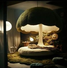 an unusual bed is lit up in the dark with two lamps on either side of it