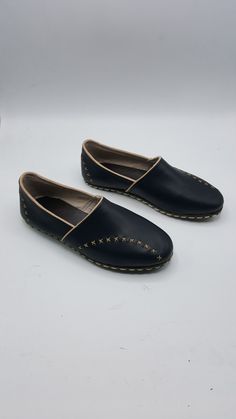 Genuine leather custom made unisex flat shoes. #loaferwomen #loafermen #flatsandals #leatherfashion Leather Slip-on Slippers For Galas, Casual Vegetable-tanned Leather Slip-on Shoes, Leather Flat Moccasins With Soft Sole, Leather Moccasins With Soft Sole, Artisan Leather Shoes With Stitched Sole And Round Toe, Flat Moccasins With Leather Sole For Galas, Artisan Leather Slip-on Shoes With Rubber Sole, Leather Slip-on Loafers With Soft Sole, Leather Loafers With Soft Sole In Slip-on Style