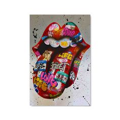 the rolling stones'tongue is covered in stickers and spray paint on a white background