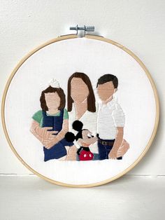 the family is depicted in this embroidery pattern